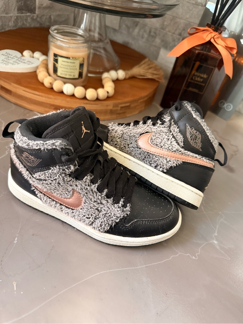 Jordan Retro 1 Fleece Boy’s High-Top Sneakers in Black and Rose Gold Accent